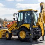 Компания Гравелит:  Экскаватор-погрузчик JCB в аренду в Песочном