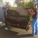 Русские Богатыри:  Профессиональная перевозка пианино