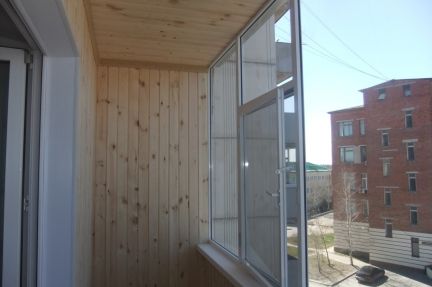 Услуги - алюминиевые балконные рамы. обшивка балконов в тюме.