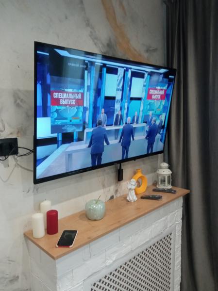 Вячеслав:  Навеска телевизора на стену