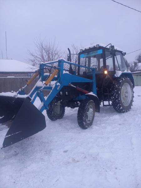 Никита:  Чистка снега трактором мтз 82