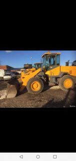 Фронтальный погрузчик амкадор