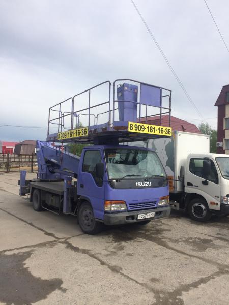 909 181. Автовышка Исузу Эльф 16 метров. Автовышка Isuzu Elf kv100 30 метров 2024. Автовышка Исузу Aichi 23 метра. Aichi sk210 Isuzu Elf.