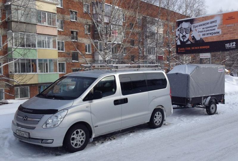 Трансфер в шерегеш из новокузнецка. Hyundai Grand Starex с прицепом. Хендай Грант Старекс к сприцепом. Хендай Гранд Старекс такси. Прицеп на Хундай Гранд Старекс.