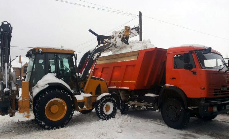 ООО Спецкран Уфа:  Уборка снега экскаватором погрузчиком САТ 428Е